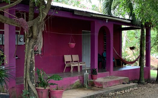 Cement House on 1 acre of land along the Hummingbird Hwy, 7 miles away from Belmopan Cayo